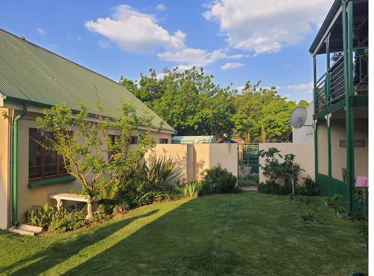 Lawn and garden beside a home